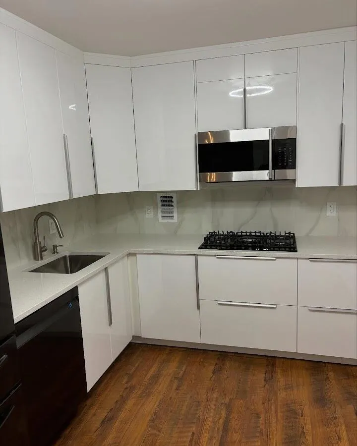 Restored kitchen with white cabinets after water damage in Lynn Haven